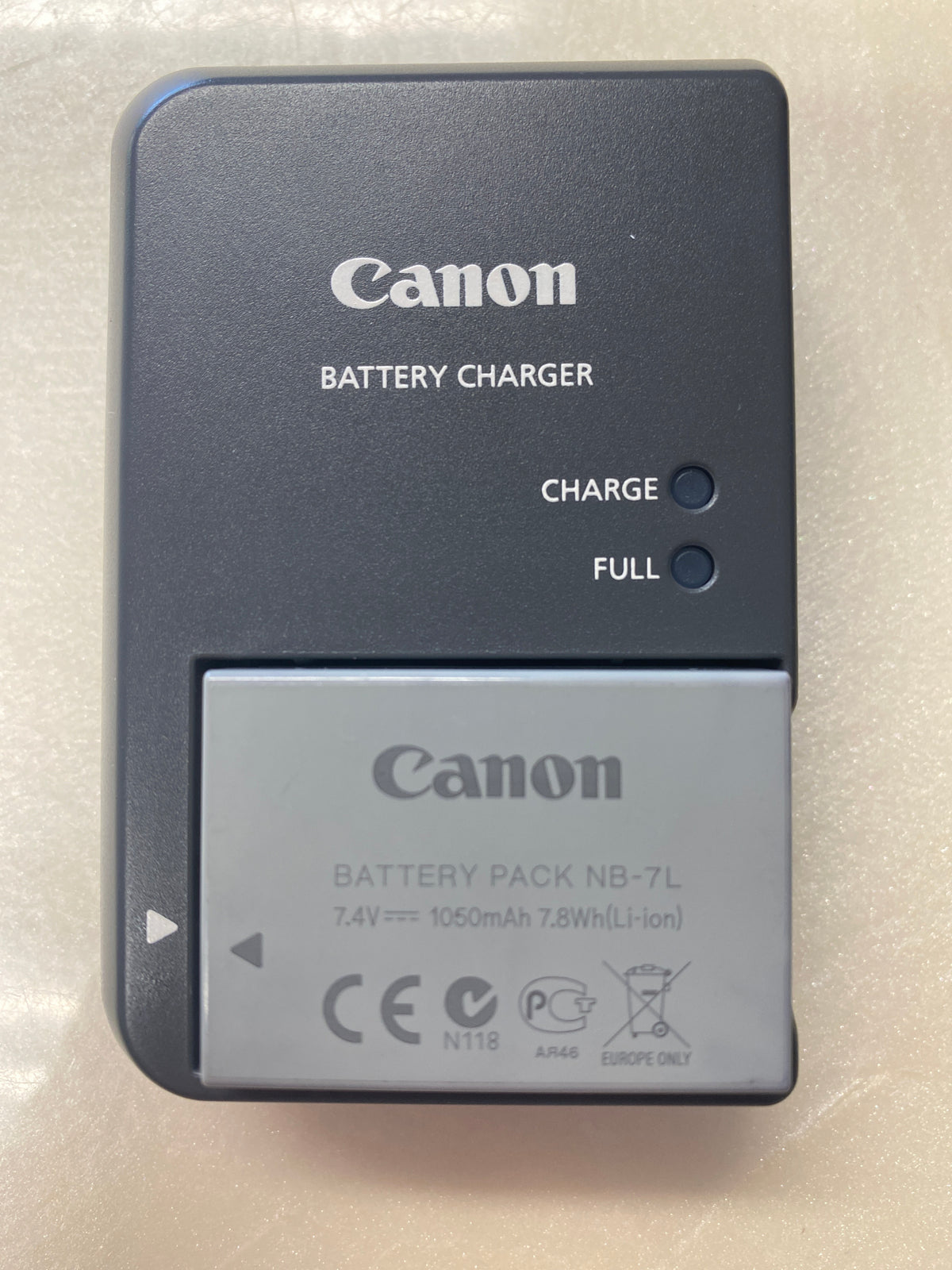 Used Canon NB-7L battery and charger